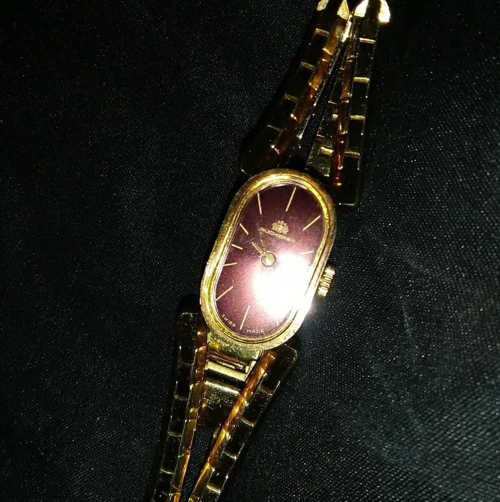 swiss made, manual wind, gold, Bucherer ladies tim